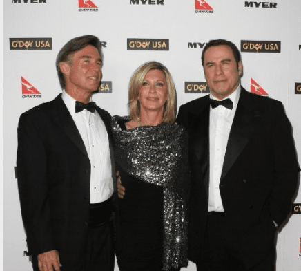 Olivia Newton-John con su esposo y John Travolta. Foto AFP